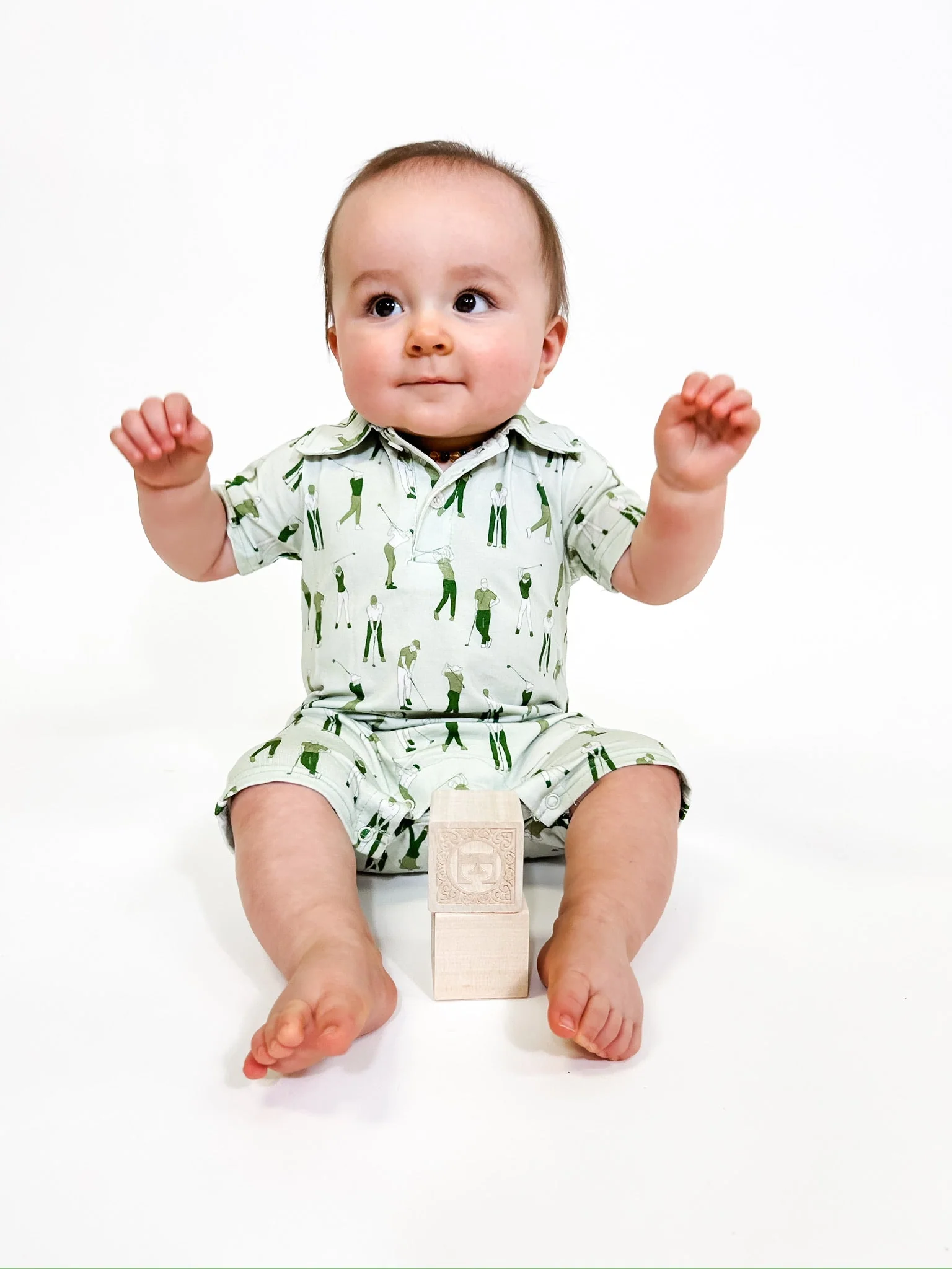 Goosies Short Sleeve Polo Romper in Golf Sketch - Image 2
